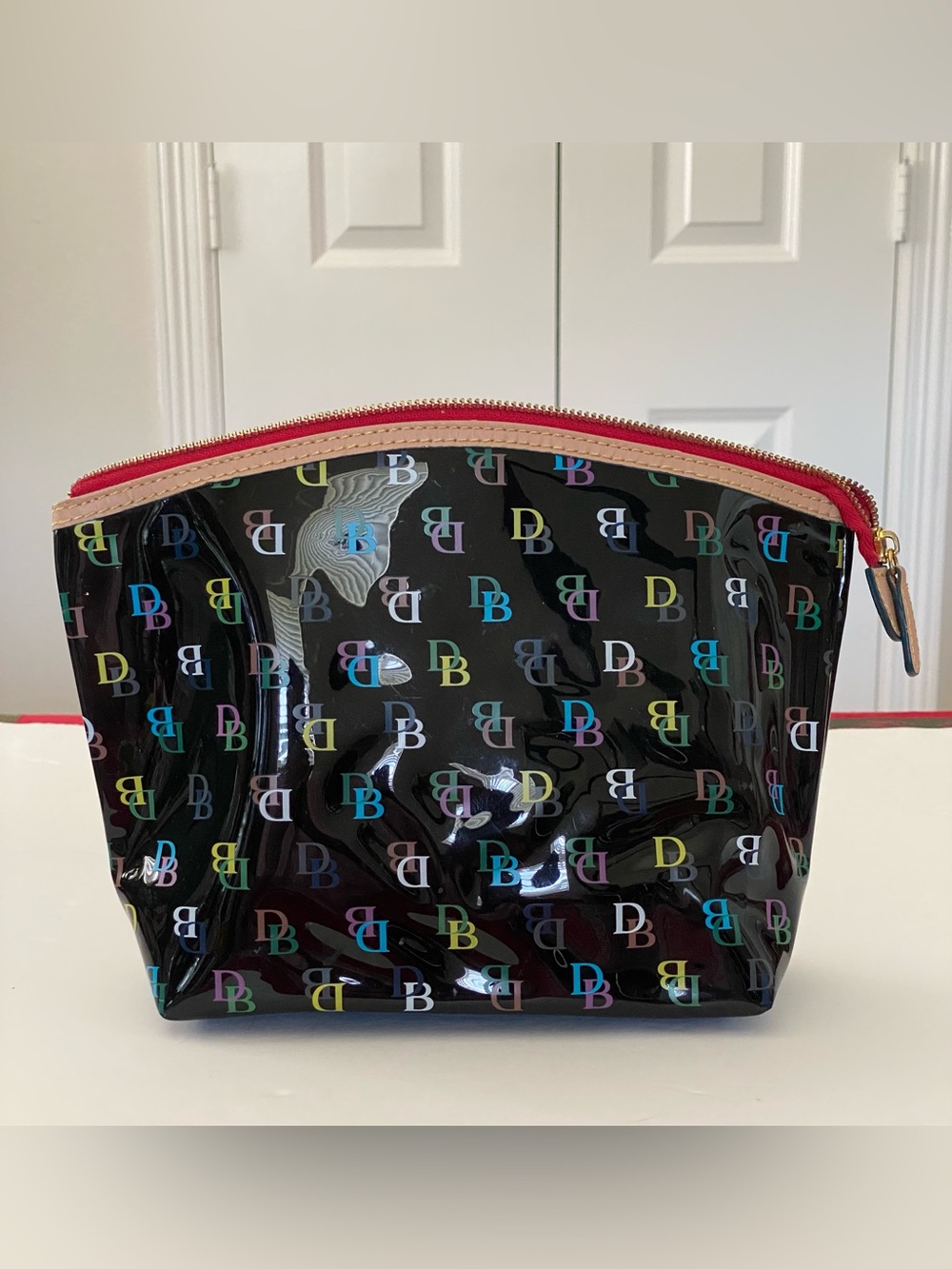 Dooney & Bourke Black Patent Cosmetic Pouch with Multicolor DB Logo Red Trim NEW